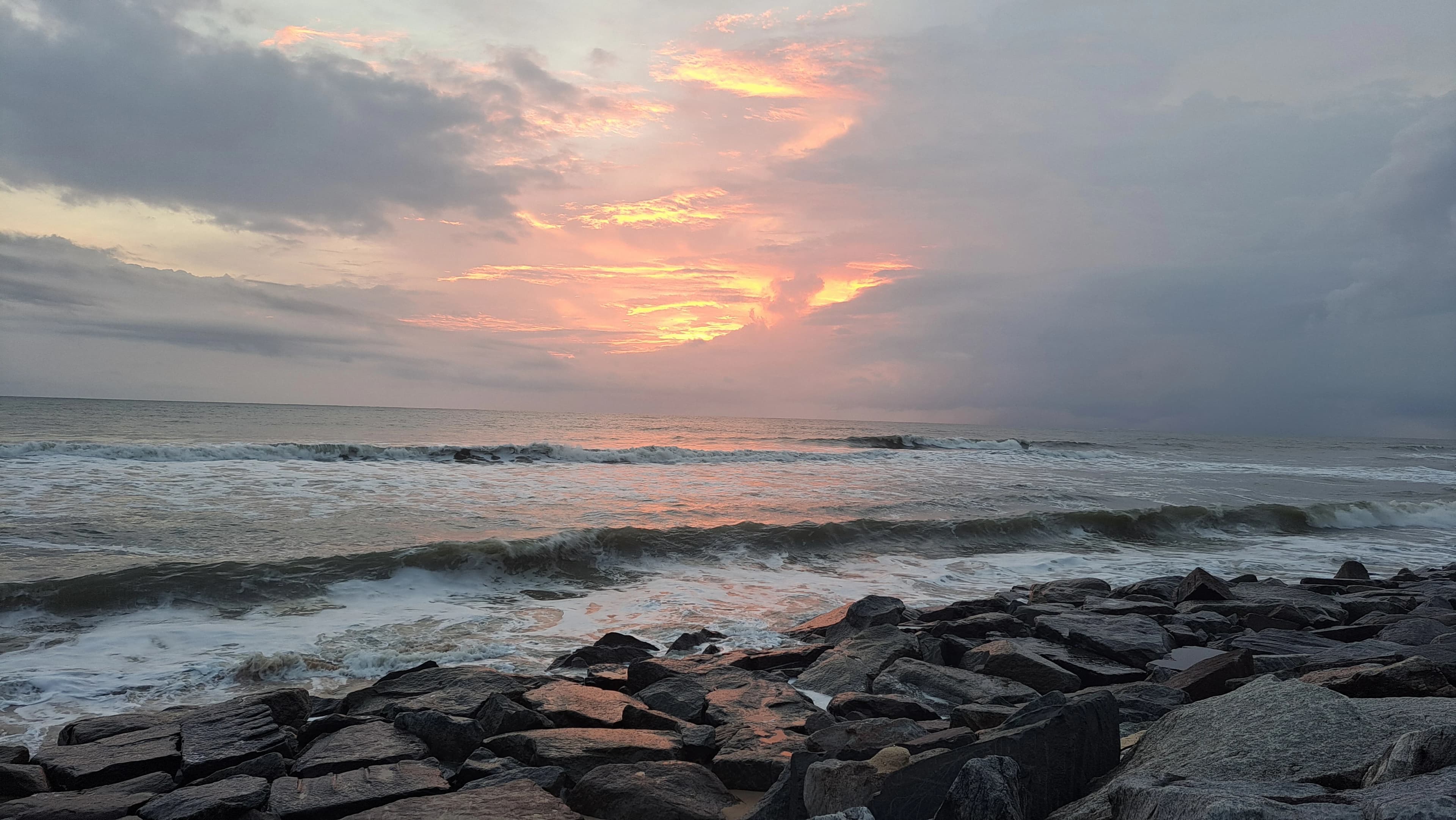 Golden hour sunset walks at the beach